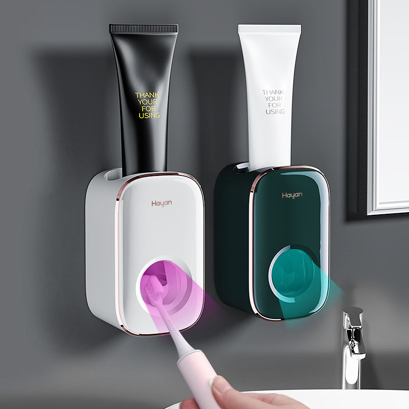 Hot Sale Household Automatic Toothpaste Dispenser Squeezer Bathroom Plastic Wall Mounted Toothpaste Dispenser
